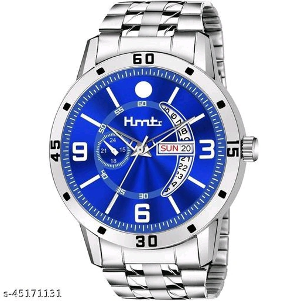  HMTr-7090-BLUE DAY AND DATE Analog Watches Strap Material: BrassCase/Bezel Material: AlloyClasp Type: BuckleDate Display: YesDial Design: EthnicDial Shape: RoundDisplay Type: AnalogDual Time: NoGps: NoLight: NoMechanism: QuartzPower Source: Battery PoweredScratch Resistant: NoShock Resistance: NoWater Resistance: NoAdd On: Additional S - Free Size