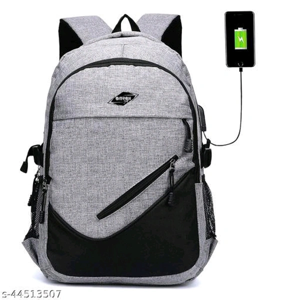 Laptop Backpack With USB Charging Port, Water Resistant Office & College Bag for Men & Women (Grey) 40 L Material: PolyesterNet Quantity (N): 1most suitable Backpack for outing, travelling, Office, School and Travel. The backpack is a multi purpose backpack, having much spac - Free Size