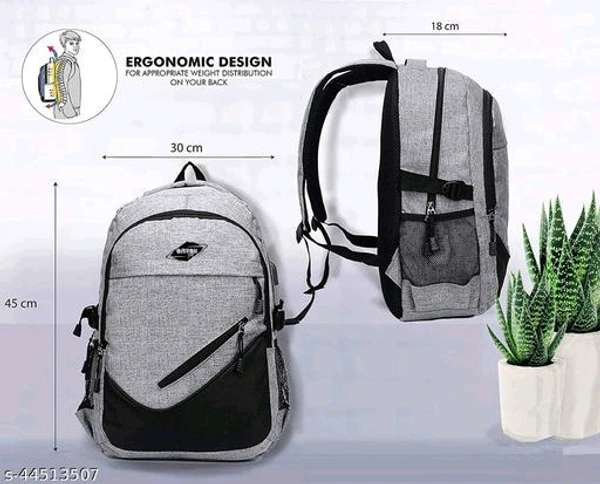 Laptop Backpack With USB Charging Port, Water Resistant Office & College Bag for Men & Women (Grey) 40 L Material: PolyesterNet Quantity (N): 1most suitable Backpack for outing, travelling, Office, School and Travel. The backpack is a multi purpose backpack, having much spac - Free Size