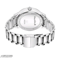 HMXT-1 Day n Date Series Men's Analog WatchesStrap Material: Stainless SteelDate Display: YesDial Design: OthersDial Shape: RoundDisplay Type: AnalogDual Time: NoGps: NoLight: NoPower Source: Battery PoweredScratch Resistant: NoShock Resistance: NoWater Resistance: NoNet Quantity (N): 1Glam up your style by adding this wonderful watc - Free Size