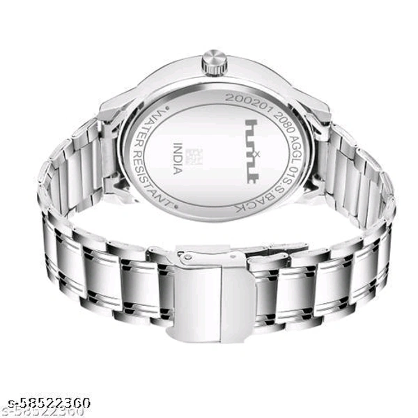 HMXT-1 Day n Date Series Men's Analog WatchesStrap Material: Stainless SteelDate Display: YesDial Design: OthersDial Shape: RoundDisplay Type: AnalogDual Time: NoGps: NoLight: NoPower Source: Battery PoweredScratch Resistant: NoShock Resistance: NoWater Resistance: NoNet Quantity (N): 1Glam up your style by adding this wonderful watc - Free Size