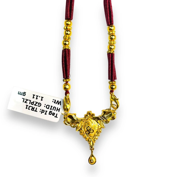 TRJ BIS 22KT 916 HUID HALLMARK GOLD PENDANT WITH TUSSEL 1 PIECE APPROX. WGT: 1.11 GM.