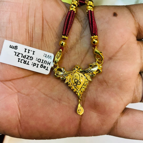 TRJ BIS 22KT 916 HUID HALLMARK GOLD PENDANT WITH TUSSEL 1 PIECE APPROX. WGT: 1.11 GM.