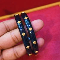 PANTHER BLACK JANGO SWASTIK DESIGN DOT KDM GOLD POLA BADHANO 1 PAIR APPROX WGT 0.400 GM - 24