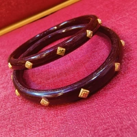 MARVEL MAROON JANGO SWASTIK DESIGN DOT KDM GOLD POLA BADHANO 1 PAIR APPROX WGT 0.400 GM - 24