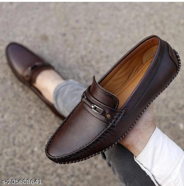 brown formal shoes for menName: brown formal shoes for menMaterial: Faux Leather/LeatheretteSole Material: RubberFastening: Slip OnToe Shape: Round ToeNet Quantity (N): 1Add a touch of sophistication to your footwear collection with our selection of brown loafers for men. These versatile shoes are perfect for both casual and dressy occasions, and are made from premium leather for a - IND8