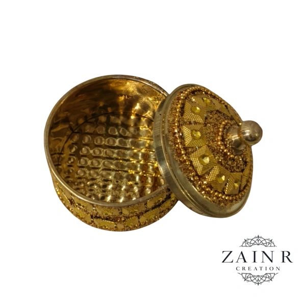 Sold By ZAIN R CREATION A Sindoor or Kumkum pot is a traditional container used to store sacred red powder - H.2'' B.2'', Brass