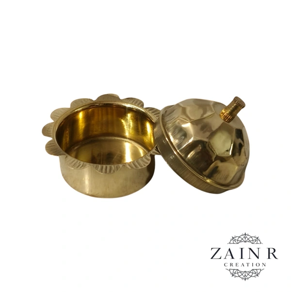 Sold By ZAIN R CREATION A Sindoor or Kumkum pot is a traditional container used to store sacred red powder - H.2'' B.2'', Brass, Brass