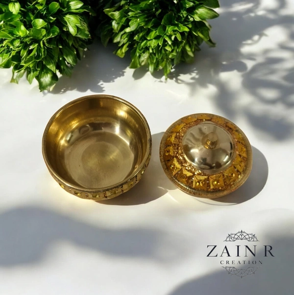 Sold By ZAIN R CREATION A Sindoor or Kumkum pot is a traditional container used to store sacred red powder - H.2'' B.2'', Brass