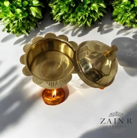 Sold By ZAIN R CREATION A Sindoor or Kumkum pot is a traditional container used to store sacred red powder - H.2'' B.2'', Brass, Brass