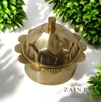 Sold By ZAIN R CREATION A Sindoor or Kumkum pot is a traditional container used to store sacred red powder - H.2'' B.2'', Brass, Brass