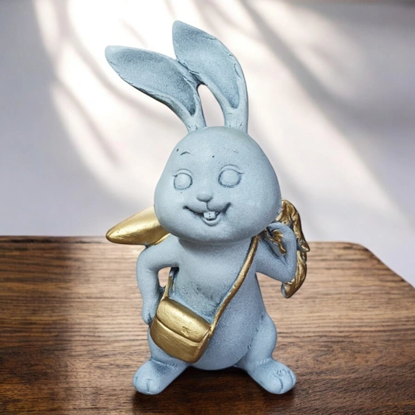 Sold By ZAIN R CREATION Rabbit With Carrot Showpiece for Home Decor - H.7'' L.4'' B.3'', Polyresin