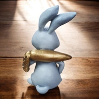 Sold By ZAIN R CREATION Rabbit With Carrot Showpiece for Home Decor - H.7'' L.4'' B.3'', Polyresin