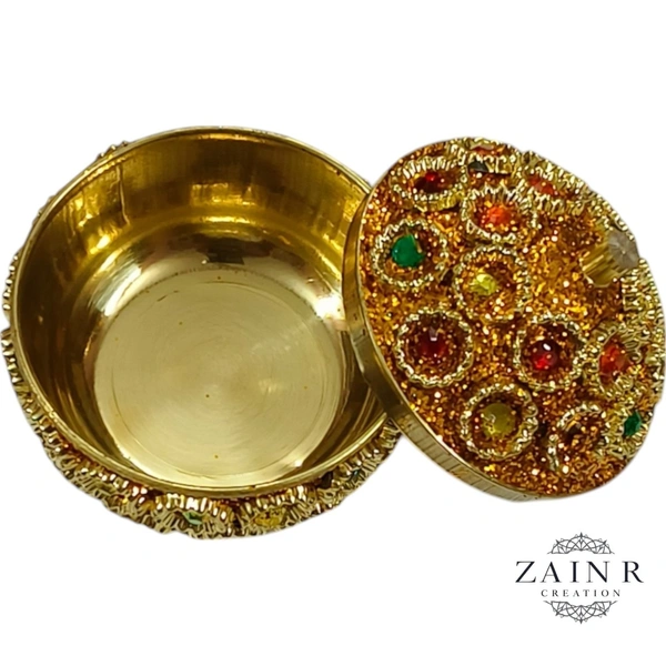 Sold By ZAIN R CREATION A Sindoor or Kumkum pot is a traditional container used to store sacred red powder - H.2'' B.2'', Brass
