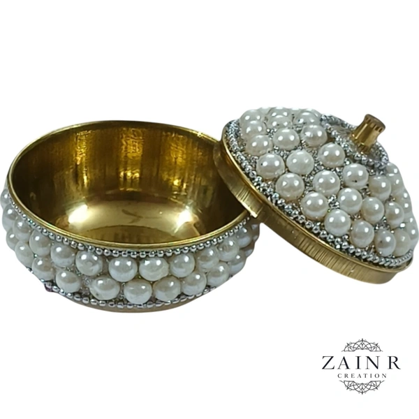 Sold By ZAIN R CREATION A Sindoor or Kumkum pot is a traditional container used to store sacred red powder - H.2'' B.2'', Brass