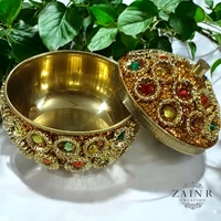 Sold By ZAIN R CREATION A Sindoor or Kumkum pot is a traditional container used to store sacred red powder - H.2'' B.2'', Brass