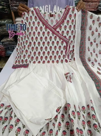 Featuring beautiful Heavy 3pcs Suit which is beautifully decorated with intricate hand mirror work and latkan with moti work.It is matching pants and Lace Dupatta - M-38