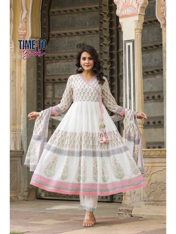 Featuring beautiful Heavy 3pcs Suit which is beautifully decorated with intricate hand mirror work and latkan with moti work.It is matching pants and Lace Dupatta - XXL-44
