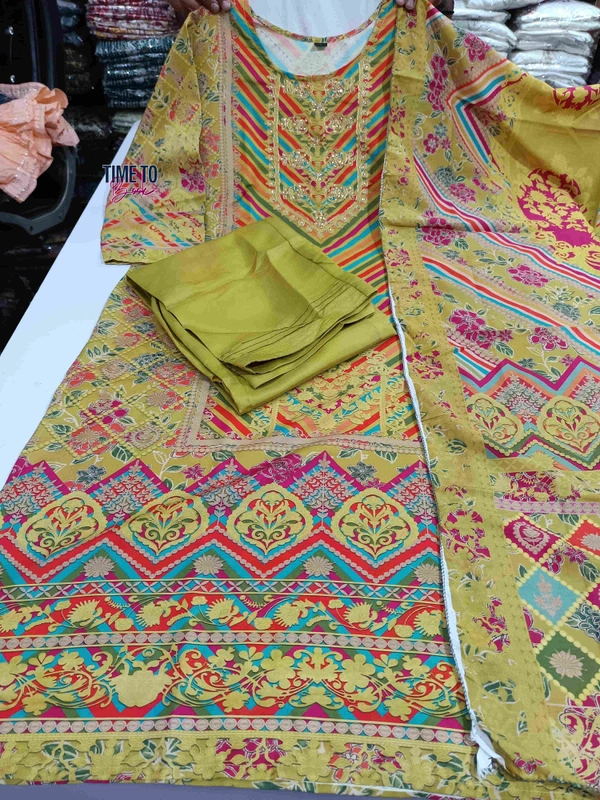 Featuring beautiful Heavy maslin rainbow style3pcs Suit which is beautifully decorated with intricate hand embroidery detail ing work. It is paired with matching pant and maslin Dupatta.* - M-38