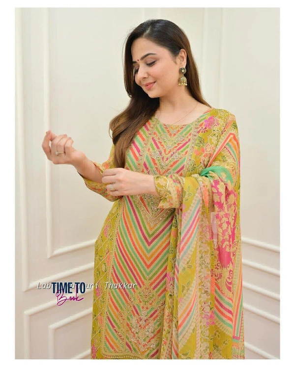 Featuring beautiful Heavy maslin rainbow style3pcs Suit which is beautifully decorated with intricate hand embroidery detail ing work. It is paired with matching pant and maslin Dupatta.* - L-40