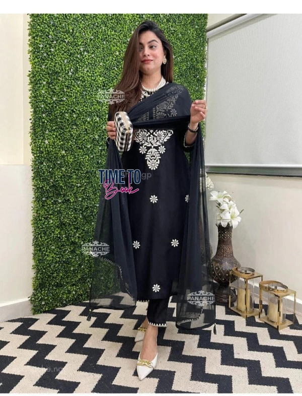 Featuring beautiful reyon 3pcs Suit which is beautifully decorated with chikan embroidery. It is paired with matching pants and shifon Dupatta. - XL-42