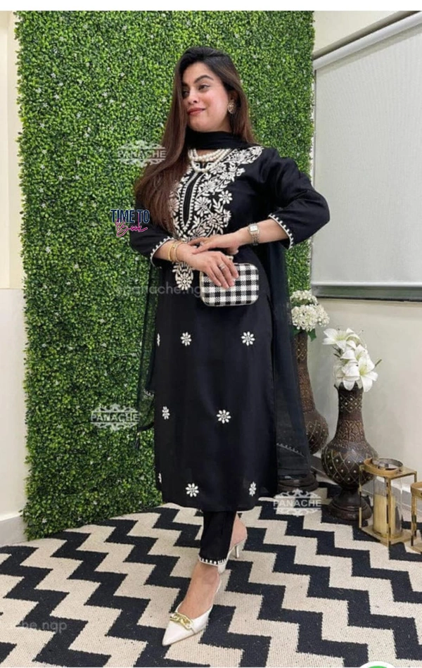 Featuring beautiful reyon 3pcs Suit which is beautifully decorated with chikan embroidery. It is paired with matching pants and shifon Dupatta. - XXL-44