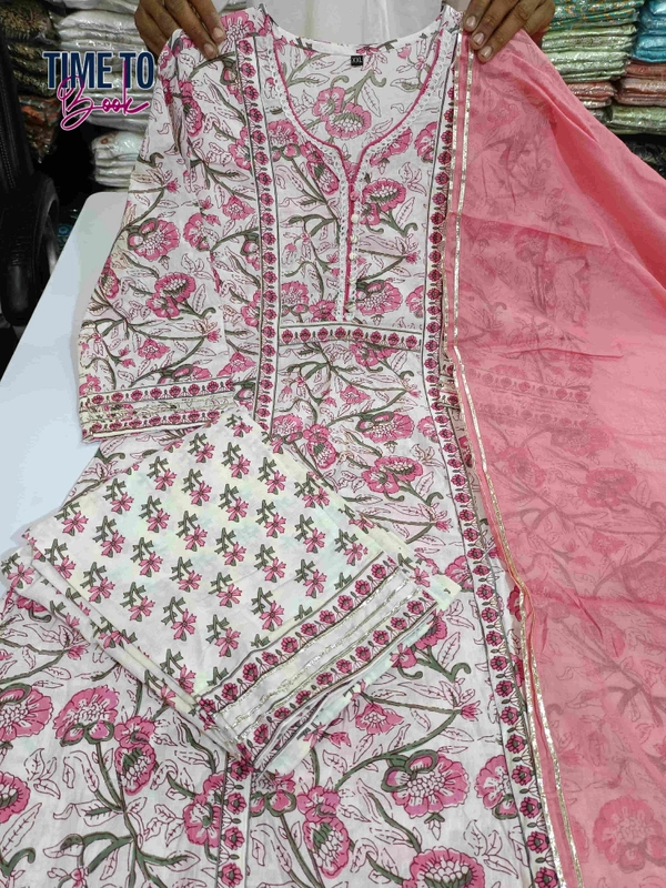 Featuring beautiful Heavy 3pcs Suit which is beautifully decorated with beautiful less & Zari weaving .It is paired with matching pants and Lace Dupatta - M-38