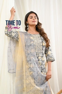 Featuring beautiful Heavy 3pcs Suit which is beautifully decorated with intricate hand mirror & Zari weaving .It is paired with matching pants and Lace Dupatta - M-38
