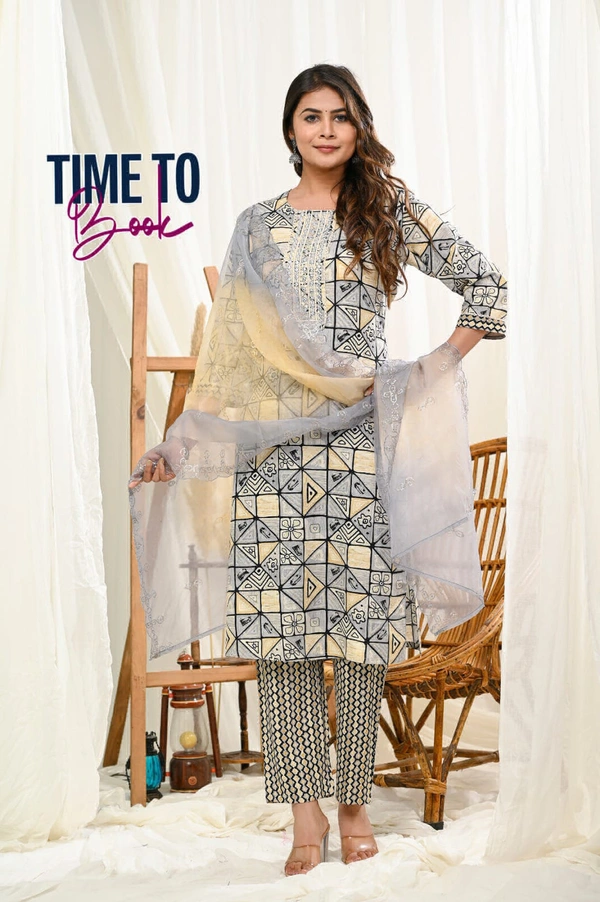 Featuring beautiful Heavy 3pcs Suit which is beautifully decorated with intricate hand mirror & Zari weaving .It is paired with matching pants and Lace Dupatta - XL-42