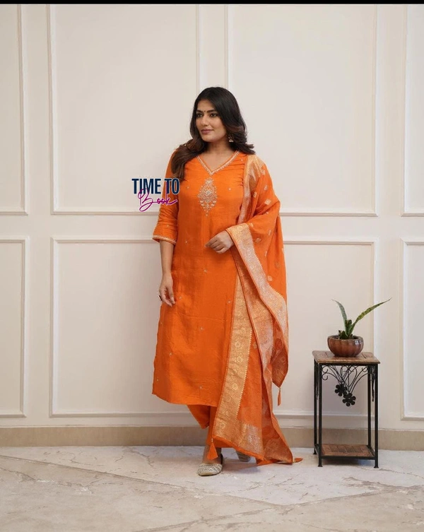 Featuring beautiful Heavy 3pcs Suit which is beautifully decorated with intricate hand embroidery & pithan. It is paired with matching pants and chandri cotton printed Dupatta. - M-38