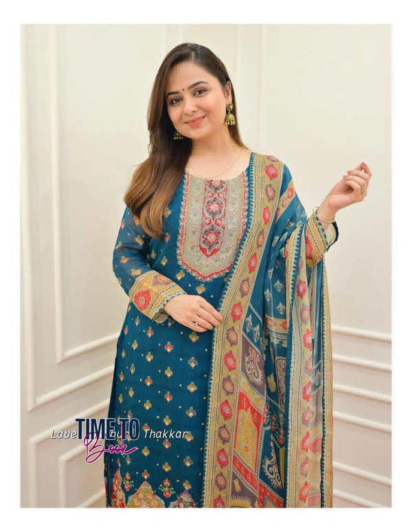 Featuring beautiful Heavy maslin rainbow style3pcs Suit which is beautifully decorated with intricate hand embroidery detail ing work. It is paired with matching pant and maslin Dupatta - XL-42