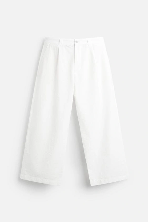 WIDE-FIT PLEATED TROUSERS