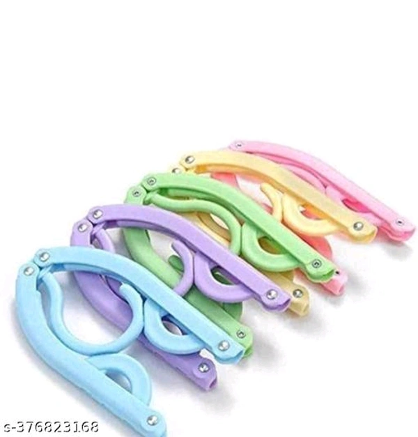 Unique Clothes Hangers PCENF5292*Material: PlasticProduct Breadth: 0.5 cmProduct Height: 13 cmProduct Length: 7.5 cmNet Quantity (N): Pack of 5Dispatch: 2 Days*Proof of Safe Delivery! Click to know on Safety Standards of Delivery Partners- https://ltl.sh/y_nZrAV3