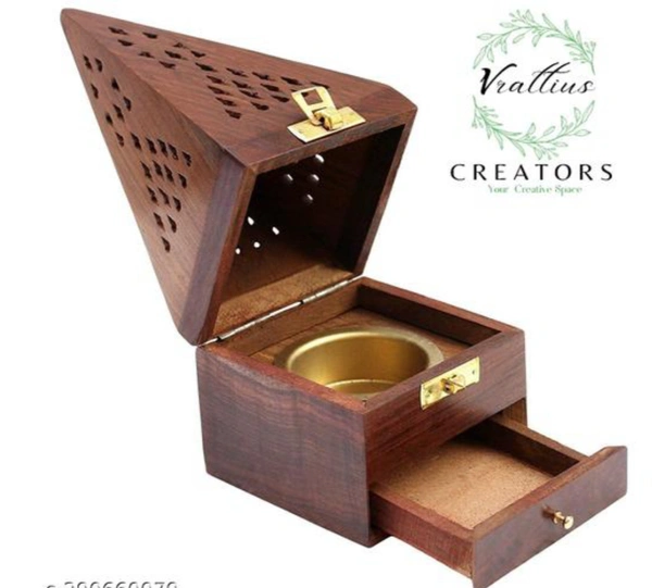 Handicrafts Handmade Incense HolderName: Handicrafts Handmade Incense HolderMaterial: WoodProduct Breadth: 3.5 InchProduct Height: 6 InchProduct Length: 3.5 InchNet Quantity (N): 1Made using strong and durable Rosewood - one of the finest timbersCountry of Origin: India