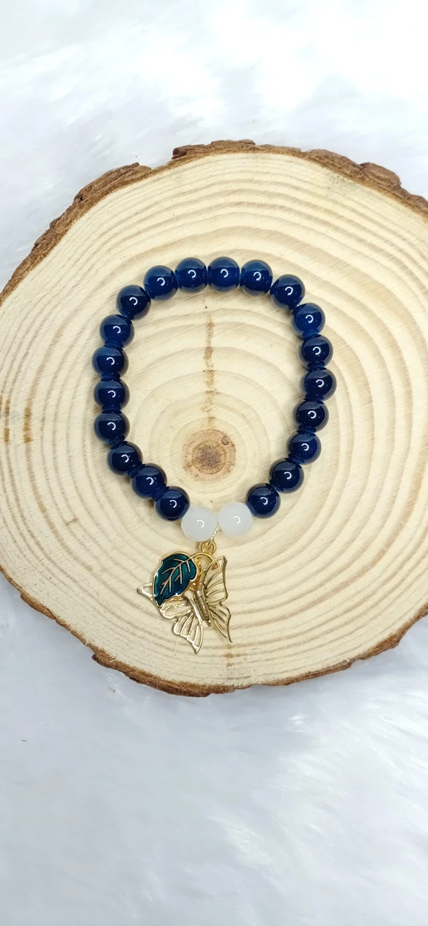 Blue Bracelet With Leaf & Butterfly Charm