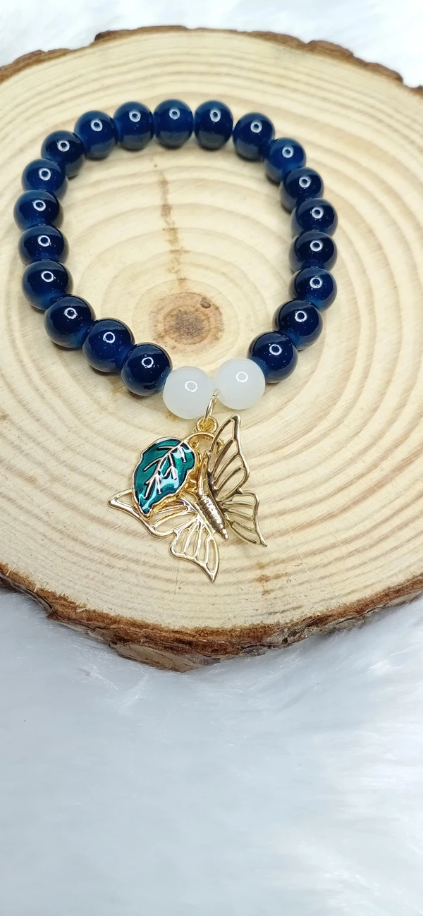 Blue Bracelet With Leaf & Butterfly Charm