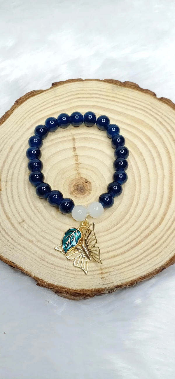 Blue Bracelet With Leaf & Butterfly Charm