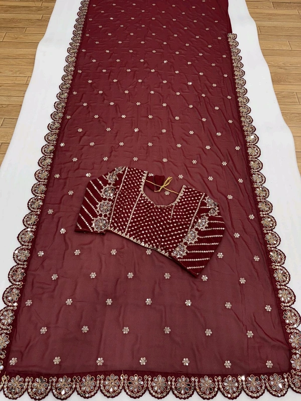 Blockbuster Mirror Work Saree With Stiched Blouse