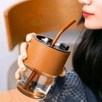Trending Cute Luxury Transparent Glass Juice Or Coffee Cup With Straw And Leather Finish Holding Grip Support MC680