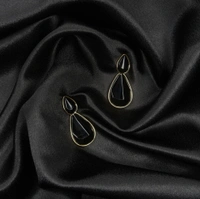 Bold & Beautiful Black Dangle Earrings – A Statement of Grace & Confidence