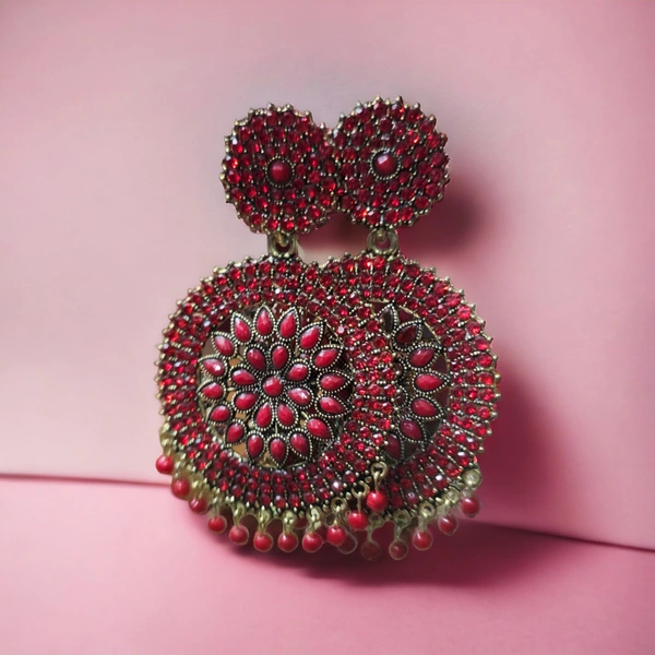 Jeweriche Imitation Elite Stone Gola Design Earrings ( Gola Stone )Base Metal : AlloyPlating : Gold PlatedSizing : AdjustableStone Type : Artificial Stones & BeadsType : ChandelierNet Quantity (N) : 1A pair of beautiful Stone Style Circular Design Earrings .Country of Origin : India