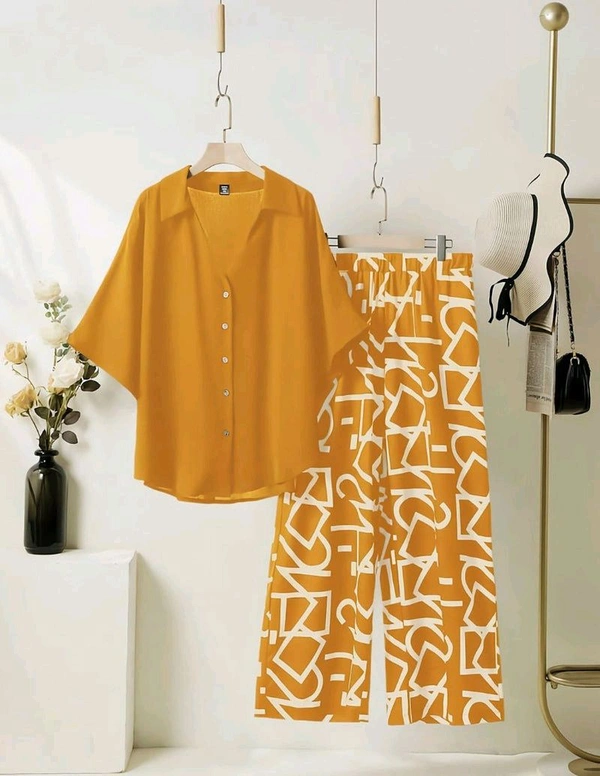 ELEGANT PINE GREEN TOP WITH GRAPHIC PALAZZO SET - Brandy Punch, XL