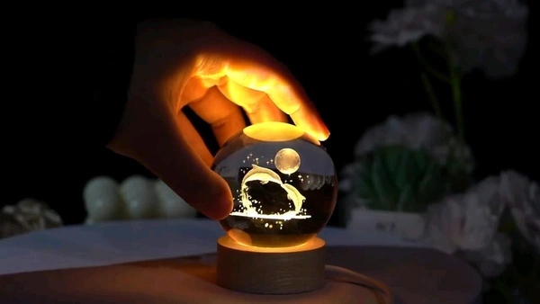 Finish TypePaintedBase MaterialWoodBulb BaseB15DProduct Dimensions6D x 8W x 6H CentimetersItem Weight350 GramsLamp TypeNight LightThis Luminous Crystal Ball Night Light is romantic for kids and adults. There are LED lamps on the wood base, and they are very bright. The product can be charged by USB and can be used as a bed light or flashlight.Beautiful Pattern: Design by 3D engravi