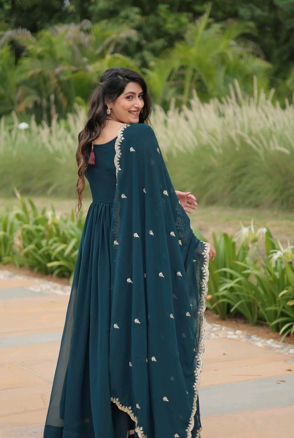 Beautiful Aqua Blue Color Zari Embroidered Work Gown
 - Big Stone, M