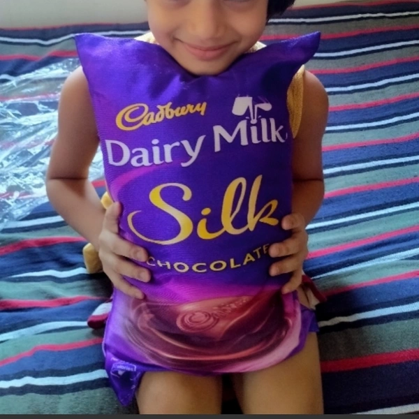 Kids playing soft pillow - Available, All India, 7 Days, Cadbury dairy milk