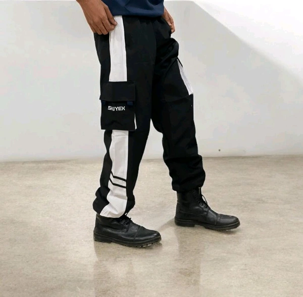 The Parachute Baggy Lower pants are a versatile and practical choice for casual wear