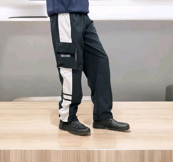 The Parachute Baggy Lower pants are a versatile and practical choice for casual wear