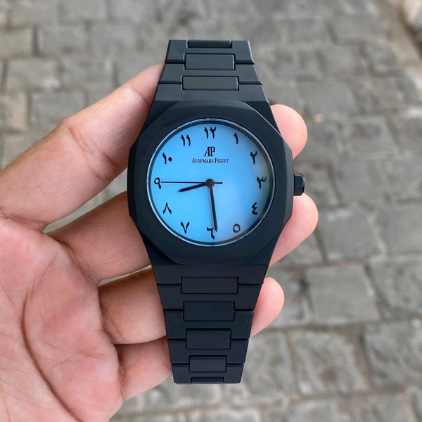 Analog Its Steel Case, Octagonal Bezel, “tapisserie” Dial And Integrated Bracelet.