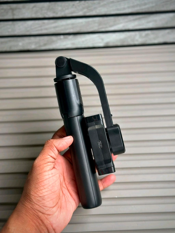 Q08 3-in-1 Gimbal Stabilizer with Selfie Stick & Tripod | Smart Anti-Shake, Bluetooth Control, 360° Rotation – Compatible with Android & iOS