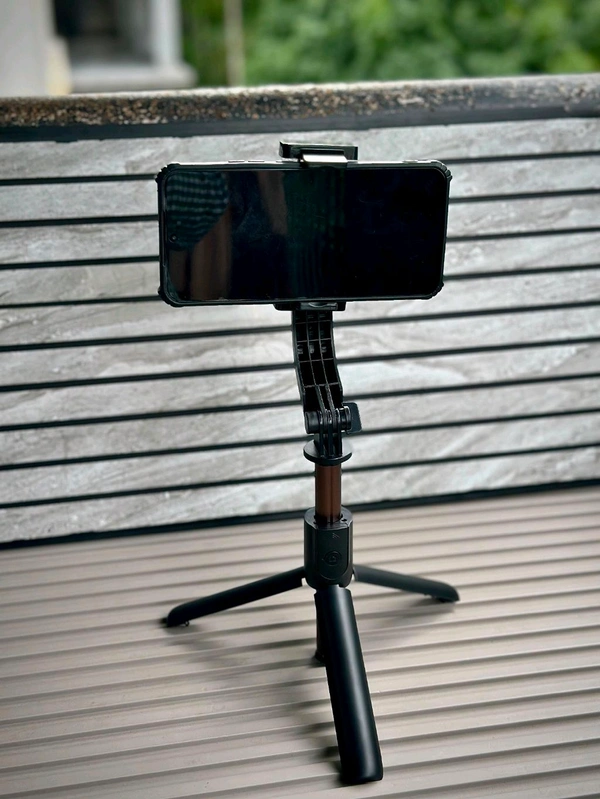 Q08 3-in-1 Gimbal Stabilizer with Selfie Stick & Tripod | Smart Anti-Shake, Bluetooth Control, 360° Rotation – Compatible with Android & iOS